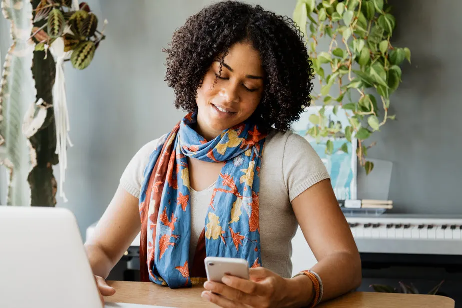Young woman checking her phone